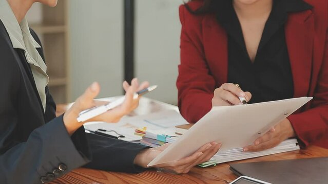 Team of business people are meeting to analyze data for marketing plan,Market research reports and income statistics, Financial and Accounting concept.