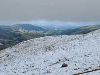 Snowfall down to low elevations dropped several inches of snow on the East Bay hills in Feb 2023