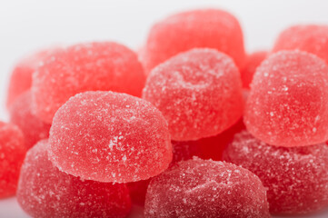 Delicious fresh raspberry marmalade on a white background close-up.