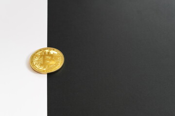 Bitcoin halving concept in cryptocurrency. Coin in black and white background.