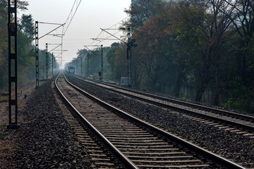 Obraz premium The Solapur Mumbai Vande Bharat Express Train heading towards Mumbai, near Pune India.