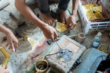 Cianjur, Indonesia. February 12, 2024: Craftsmen of traditional muslim lantern lamps in Cianjur are...