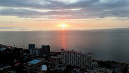 sunrise over the ocean in maputo, mozambique