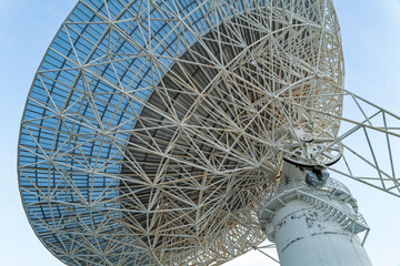 The complex scaffolding supporting a large radio telescope dish