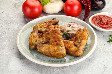 Grilled chicken wings with sauce