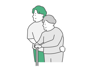 高齢女性の歩行介助をする男性介護士