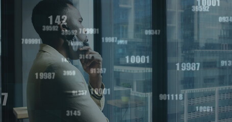 Image of financial data processing over businessman with face mask thinking in office