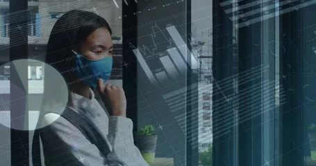 Zelfklevend Fotobehang Aziatische plekken Image of financial data processing over asian businesswoman with face mask in office
