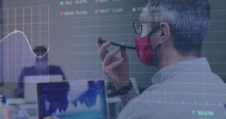 Image of financial data processing over businessman with face mask using smartphone in office