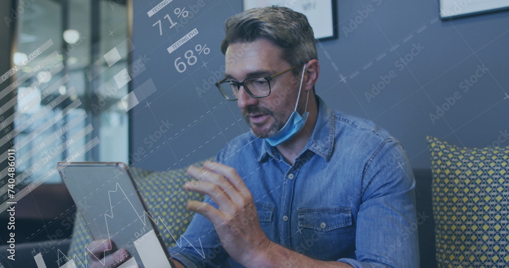 Poster image of financial data processing over businessman with face mask using tablet in office