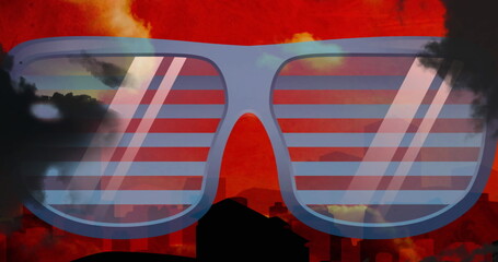 Image of smoke and blue glasses on red background