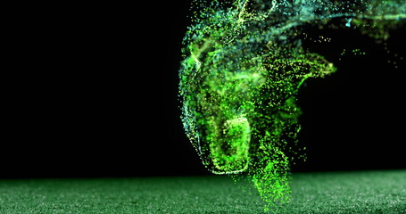 Image of glowing green particles moving over rugby ball on pitch