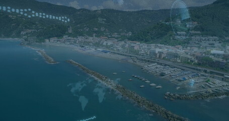 Image of data processing over aerial view of coastal city