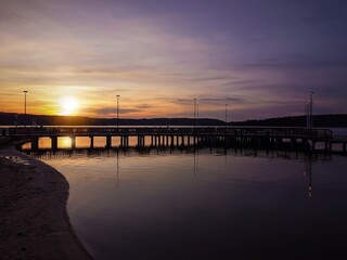 Sunset at the pier. Lake Ukiel. Poland