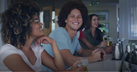 Image of happy diverse friends drinking beer