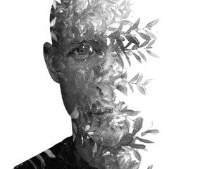 A black and white double exposure disappearing male portrait - 740498047