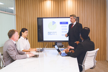 Presentation of business man in a meeting, teamwork planning and brainstorming to feedback and review. Presenter share ideas, to collaboration team group and partnership with documents