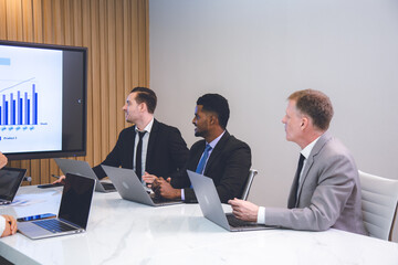 Presentation of business man in a meeting, teamwork planning and brainstorming to feedback and review. Presenter share ideas, to collaboration team group and partnership with documents