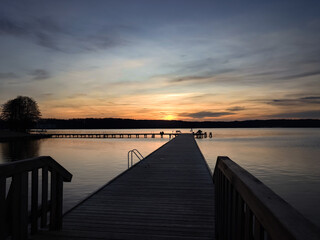 Pier at sunset. Lake Ukiel - Olsztyn, Poland