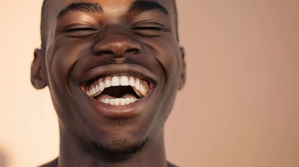 Handsome unshaven young darkskinned male laughing out loud at funny meme he found on internet smiling broadly showing his white straight teeth Positive human facial expressions and emo : Generative AI