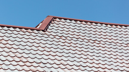 Metal tiles on the roof as an abstract background. Texture