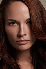 Woman, portrait and cosmetics for haircare in studio, attitude and keratin treatment or shampoo....