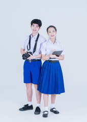 Back to school. Student. Boy and girl with tablet and dslr camera.