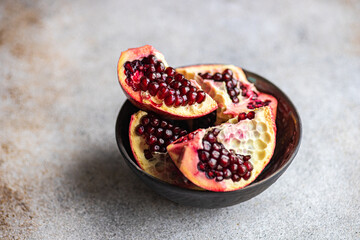 Raw organic pomegranate in the bowl