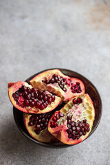 Raw organic pomegranate in the bowl