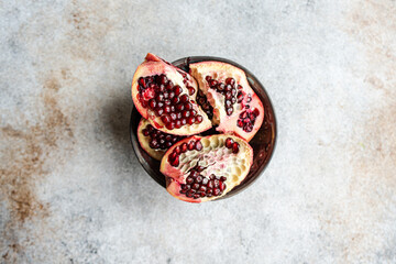 Raw organic pomegranate in the bowl
