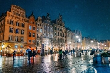 evening street in the old town in Gdansk Poland, snowstorm