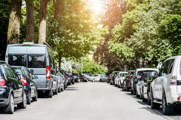 Parking Car Problems. Parking Lot Cars on Street Road is Full in Green City in Europe.
