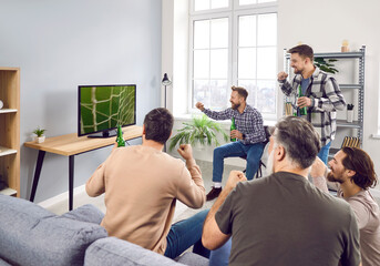 Group of football fans watching soccer sport match together. Cheerful male friends watching sports...