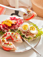 Open faced Bagel with tuna and mixed salads for breakfast. Morning time. Fresh meal. Delicious food. Scandinavian style. Homemade food. Cooking recipes. Brunch. Healthy recipes. Vegetable.Clean food. 