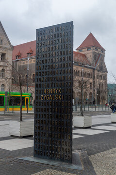 Poznan, Poland - January 28, 2024: Monument to Polish cryptologists whose breaking of Germany's Enigma machine ciphers. View on site of monument with Henryk Zygalski name.
