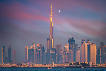 Dazzling Dubai skyline: Iconic skyscrapers, illuminated cityscape, and futuristic architecture...