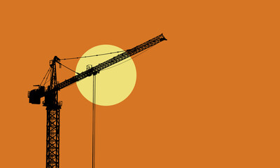 Construction site silhouette with tower crane and the rising sun