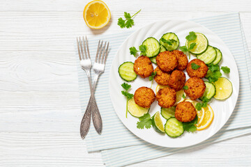 fried rice cutlets, rice tikki on white plate