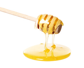 Natural honey dripping from dipper on white background