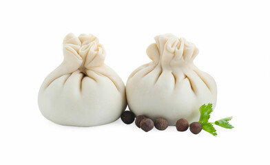 Uncooked khinkali (dumplings) and spices isolated on white. Georgian cuisine