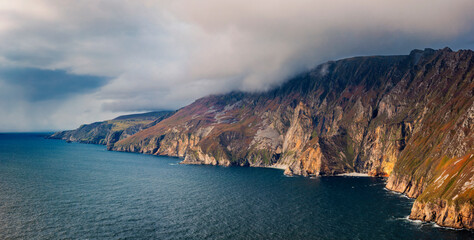 Slieve League or Slieve Liag - A dramatic landscape photo featuring the Slieve League,  The mountain on the Atlantic coast of County Donegal, Ireland. One of the highest sea cliffs in Europe.