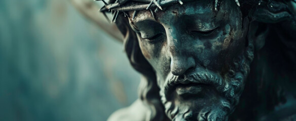 Close-up of a Jesus Christ statue with a crown of thorns, conveying sorrow and sacrifice with a serene expression Ideal for religious themes, banner format with ample copy space - obrazy, fototapety, plakaty
