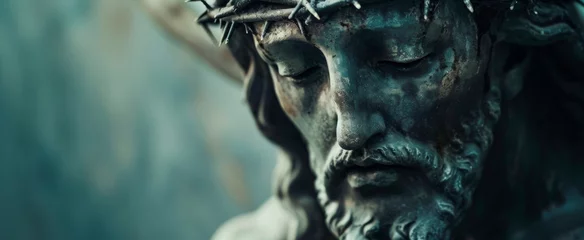 Fotobehang Close-up of a Jesus Christ statue with a crown of thorns, conveying sorrow and sacrifice with a serene expression Ideal for religious themes, banner format with ample copy space © Andrei