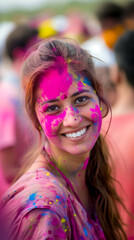 portrait of beautiful girl face covered in multicolored colors powder while playing holi festival