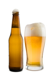 Bottle and glass of blonde beer with foam, isolated on white background