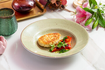 Fish cutlet with grilled pepper. Lunch.