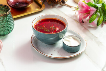Borscht soup with sour cream. Lunch.