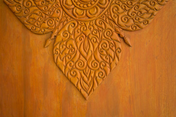 Pattern of wood carving art. The Thai art and craft texture on wooden background.  Thai-definition...