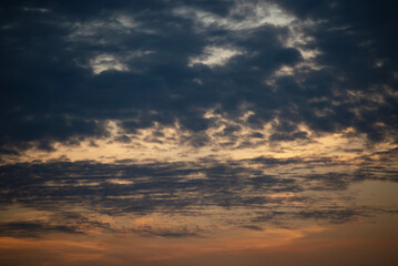 Real majestic sunrise sundown sky background with gentle colorful clouds