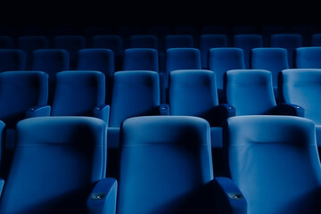 empty blue seats in cinema, domestic intimacy, zoom in, up close
